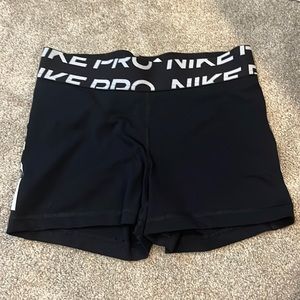 nike pros size medium